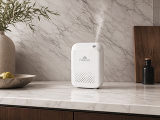 White Rimini Plus diffuser on a marble surface, lifestyle view