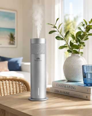 Silver Venice Ultimate diffuser on a shelf beside a plant in a styled living space